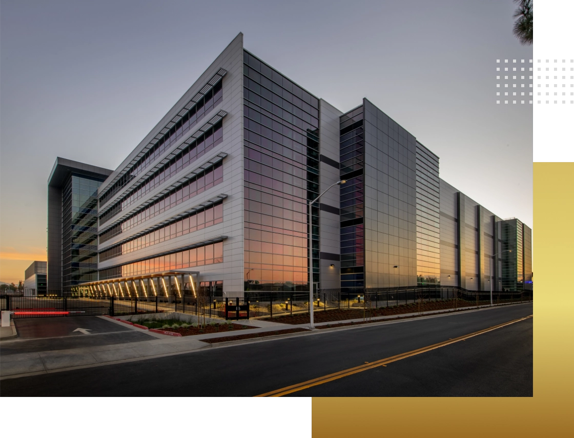Modern office building at sunset.