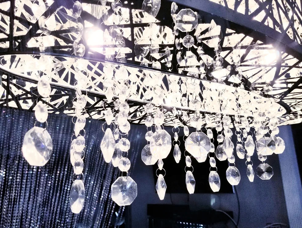 Crystal chandelier with geometric frame.