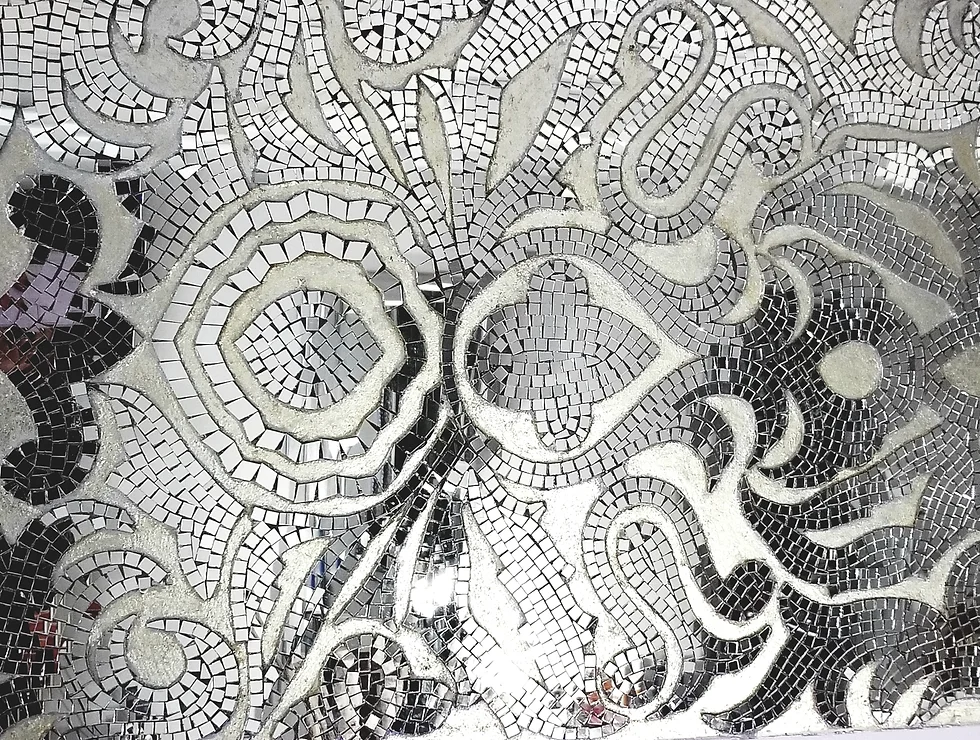 Silver mirrored mosaic tile art.